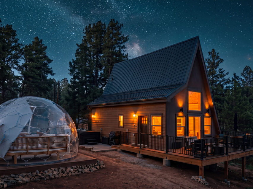 A mountain cabin with a stargazing dome