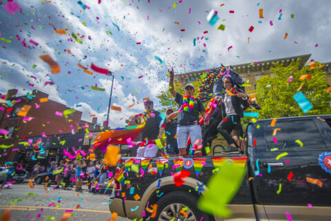 A truck releasing confetti during the Denver Pride Parade.