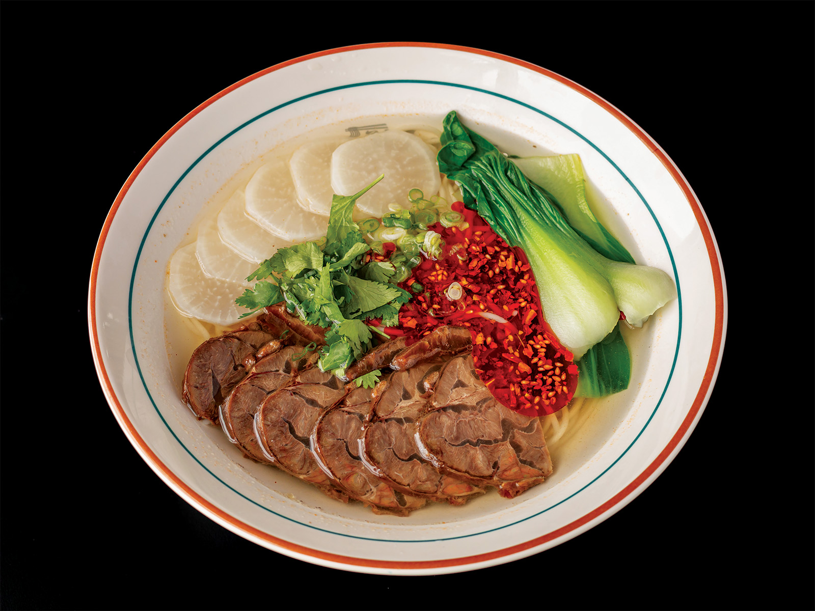 Meat and veggies and noodles in soup