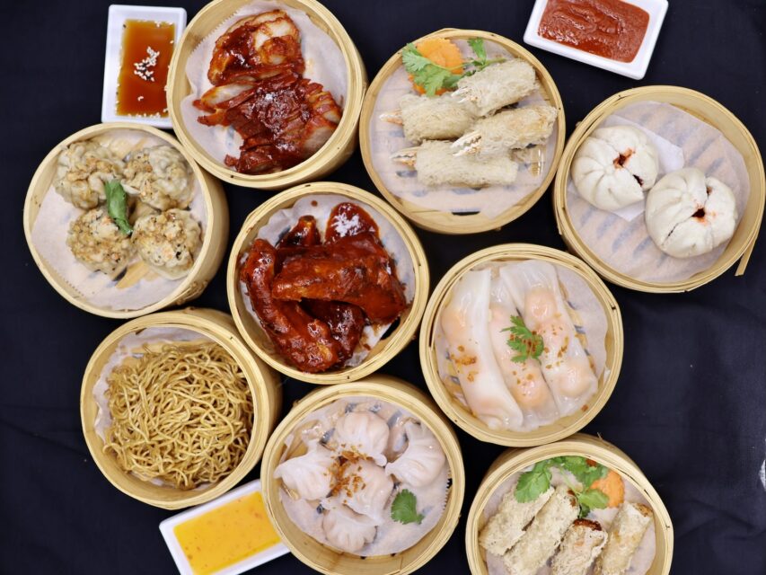 Multiple Chinese dim sum items in steamer baskets