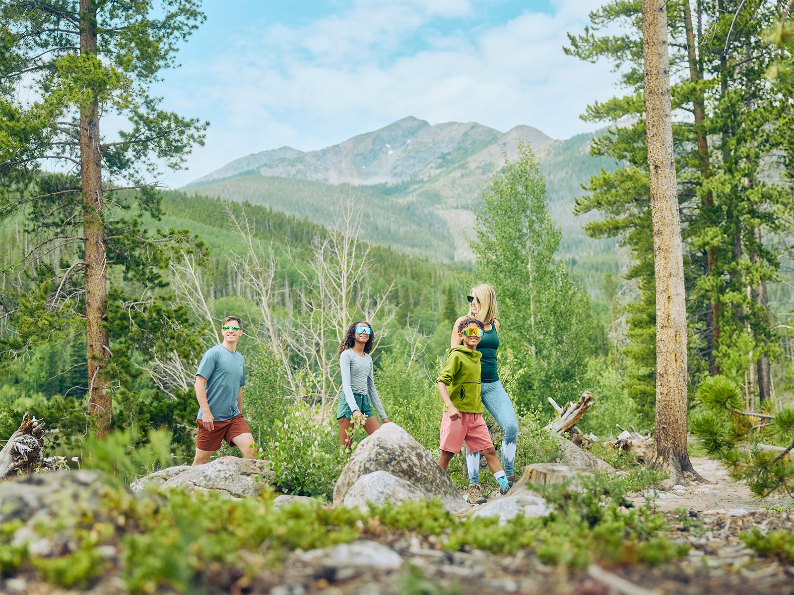 Four hikers on the Rainbow Lake Trail