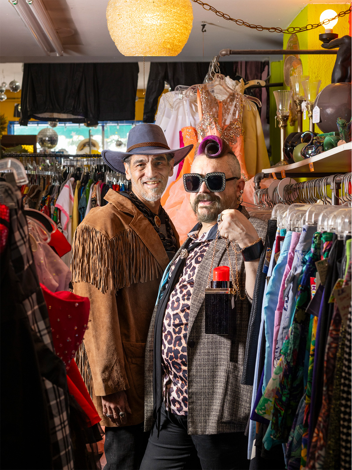 Two men wearing eccentric garb in Regal Vintage in Denver