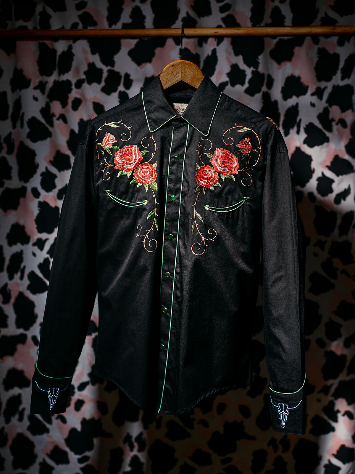 A black shirt with red roses from Rockmount Ranch Wear