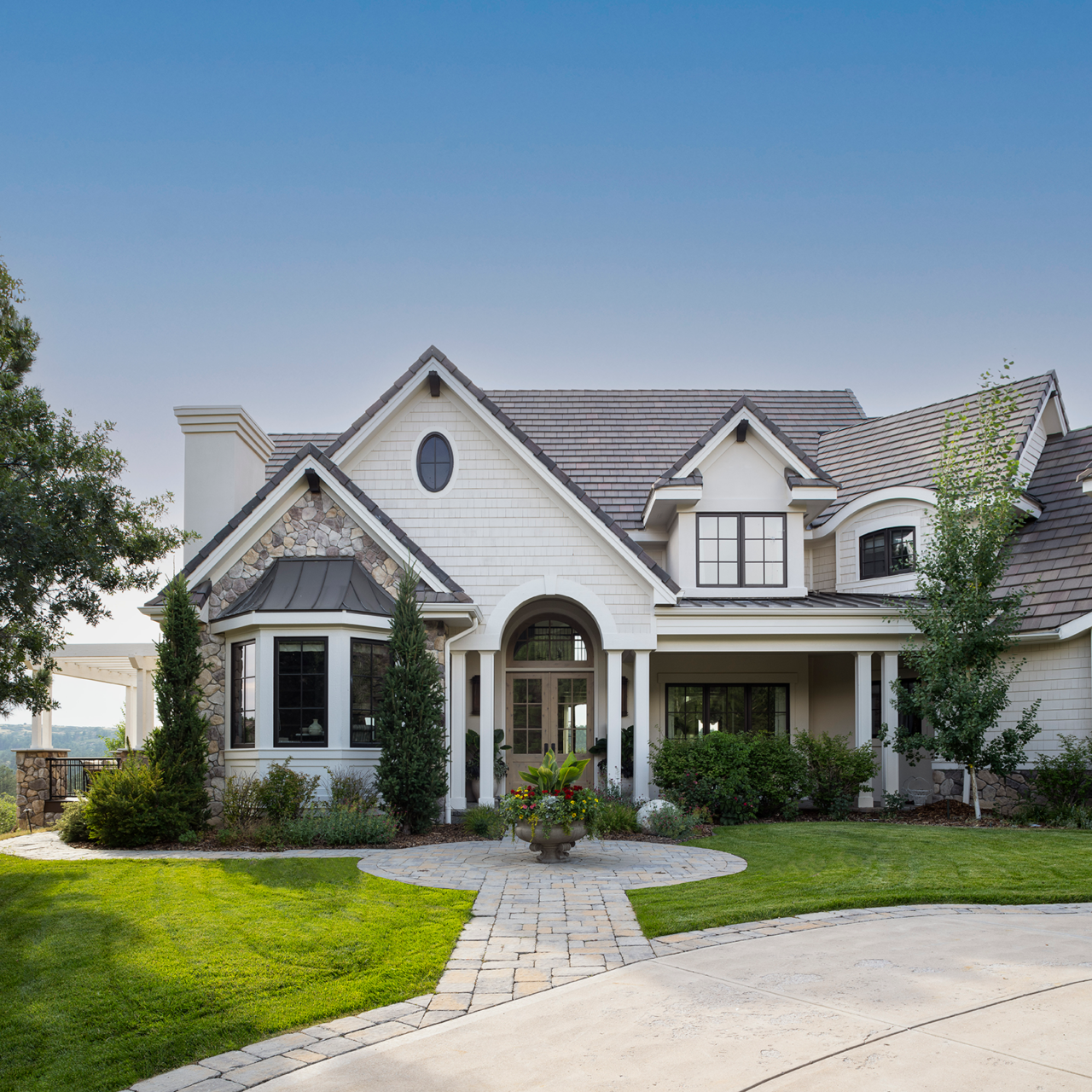 White and stone facade of a two-story home