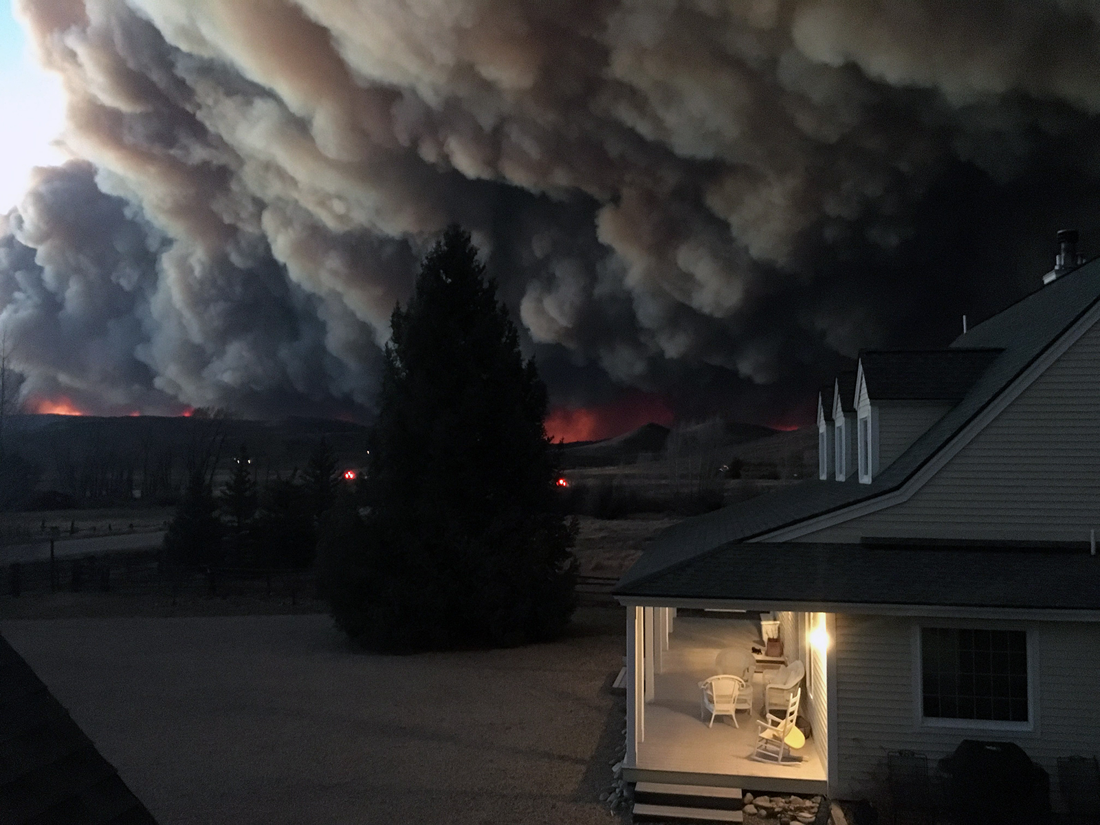 The East Troublesome Fire burns near a home in Granby, Colorado