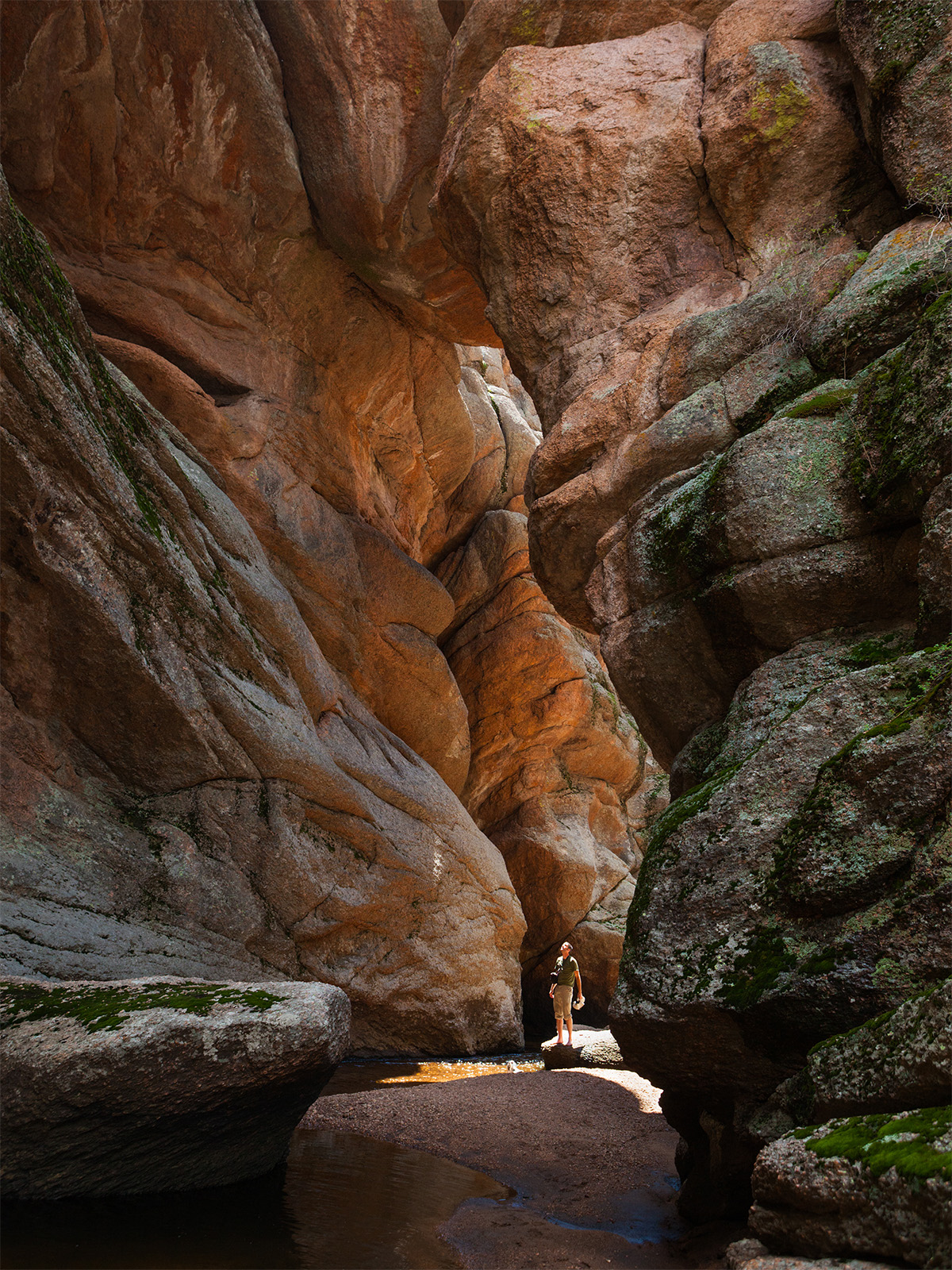 A hiker exploring rock formations in the Lost Creek Wilderness in Colorado
