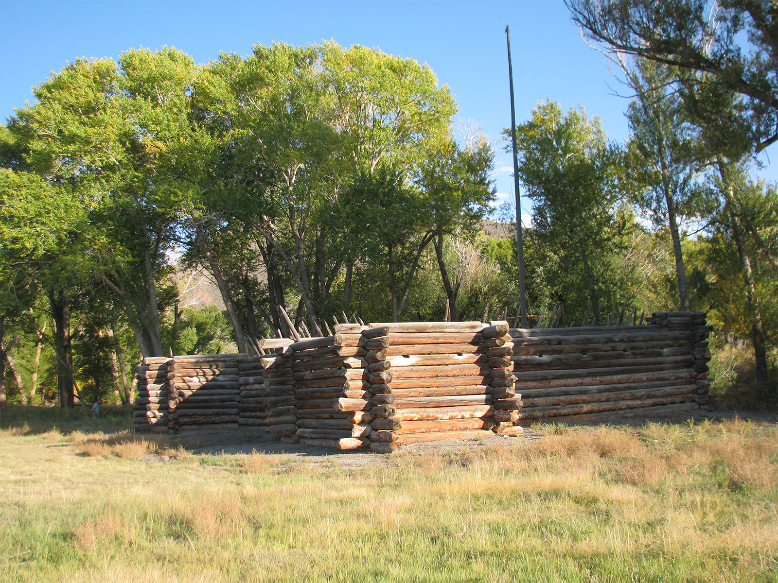 A blockade of wooden slats in a field