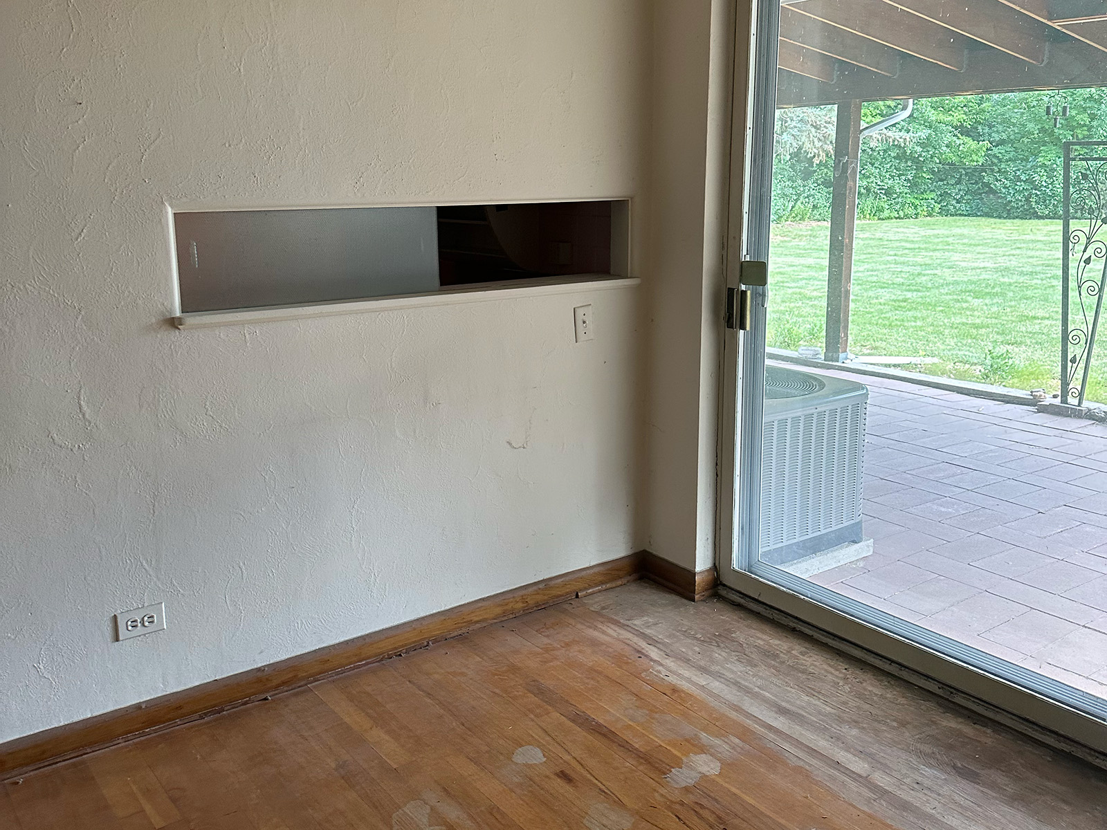Empty room with a sliding glass door