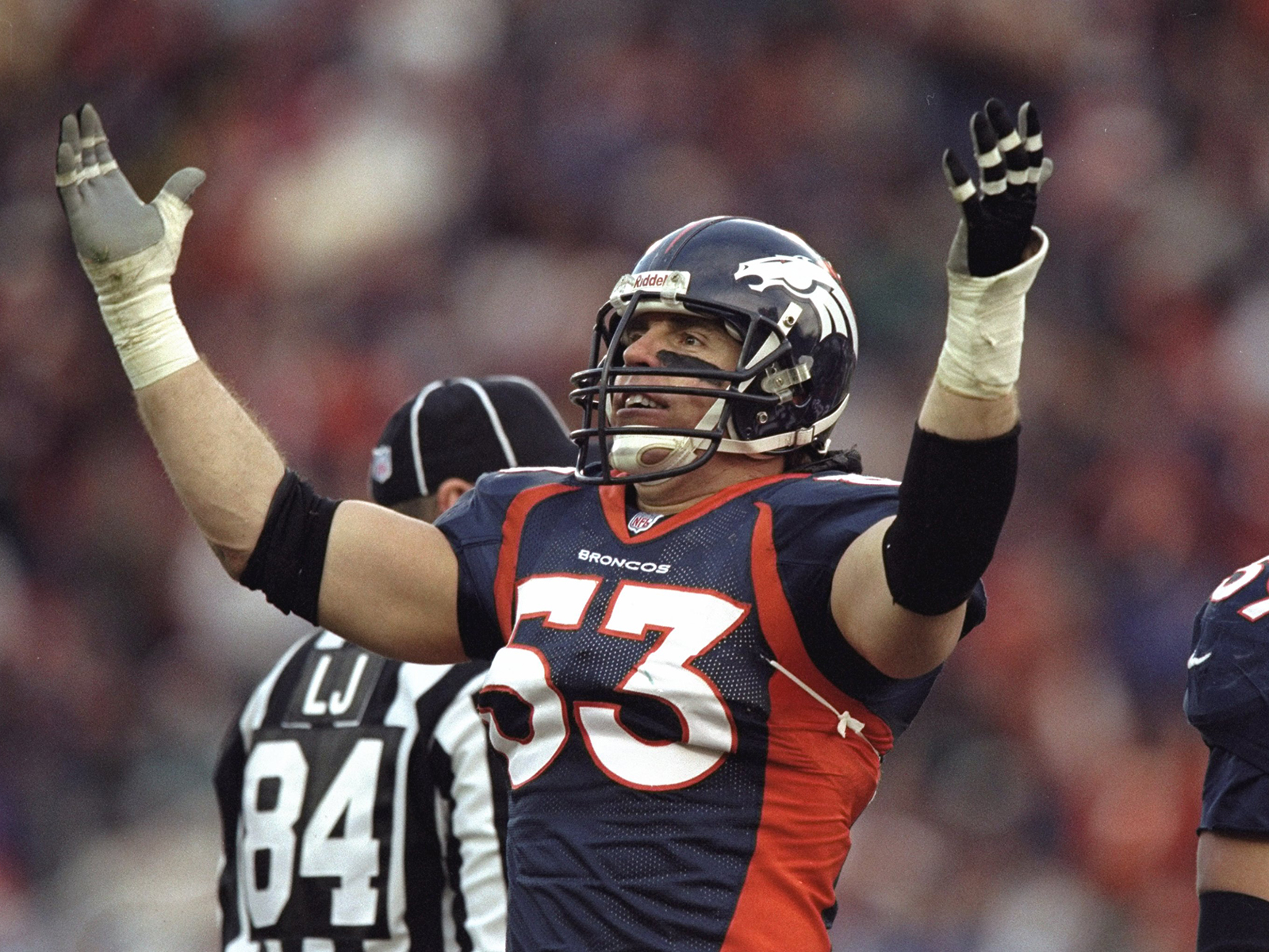 Bill Romanowski showboating in Denver