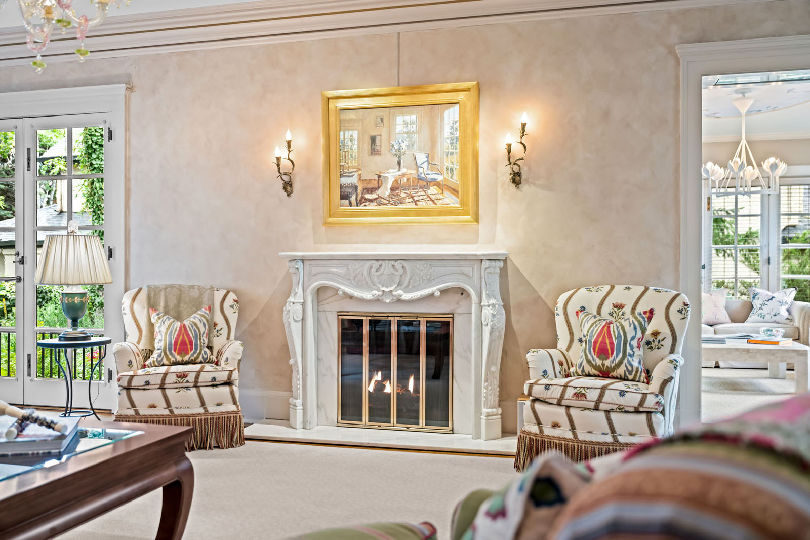 Fireplace flanked by two chairs