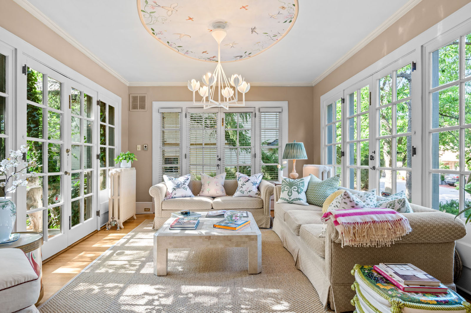 Living room with French doors on three wals