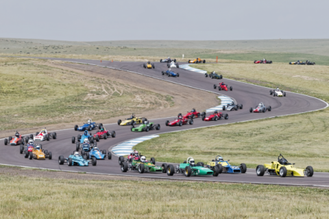 Race cars on a race track