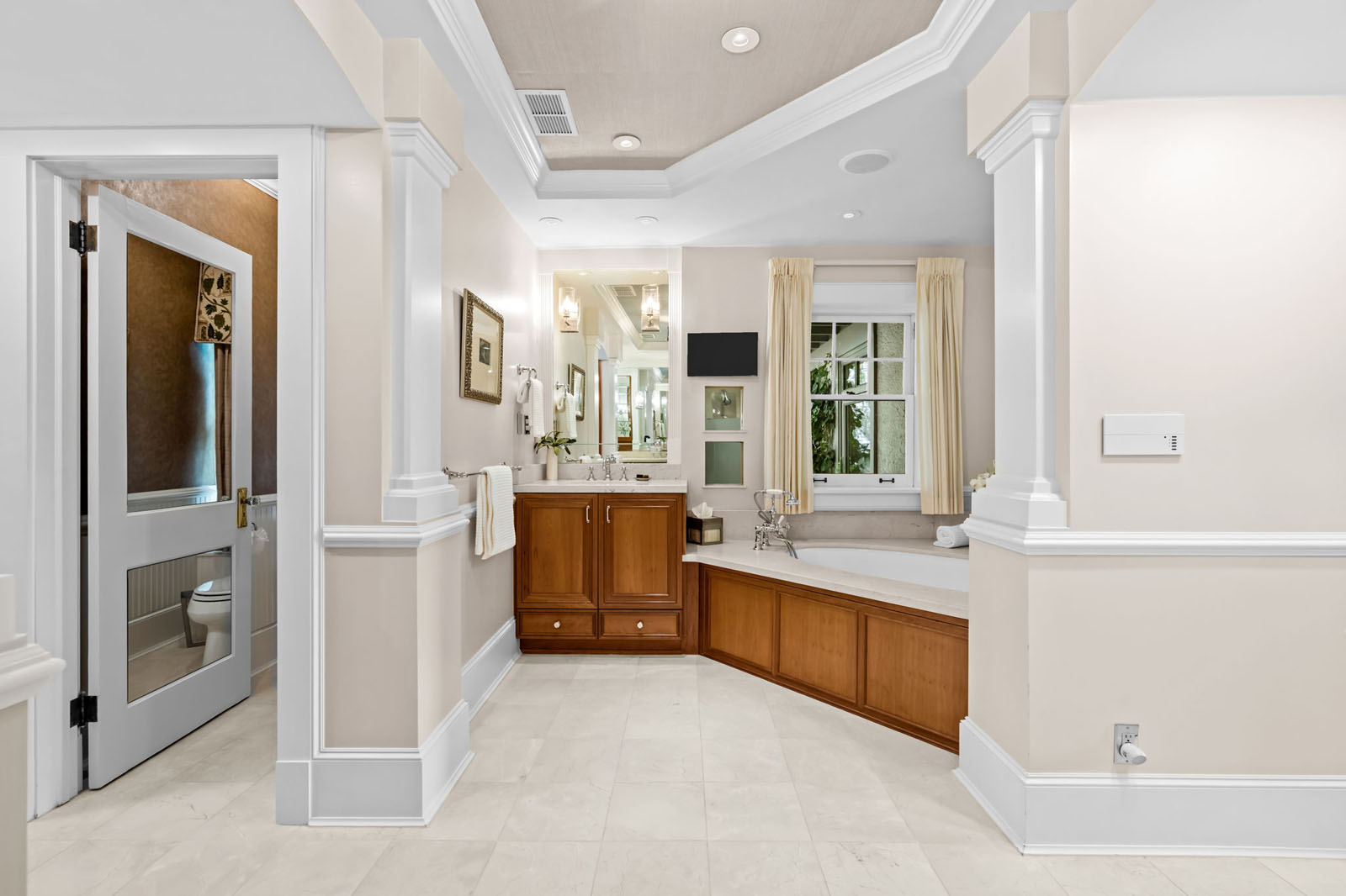 Primary bathroom with a jacuzzi tub