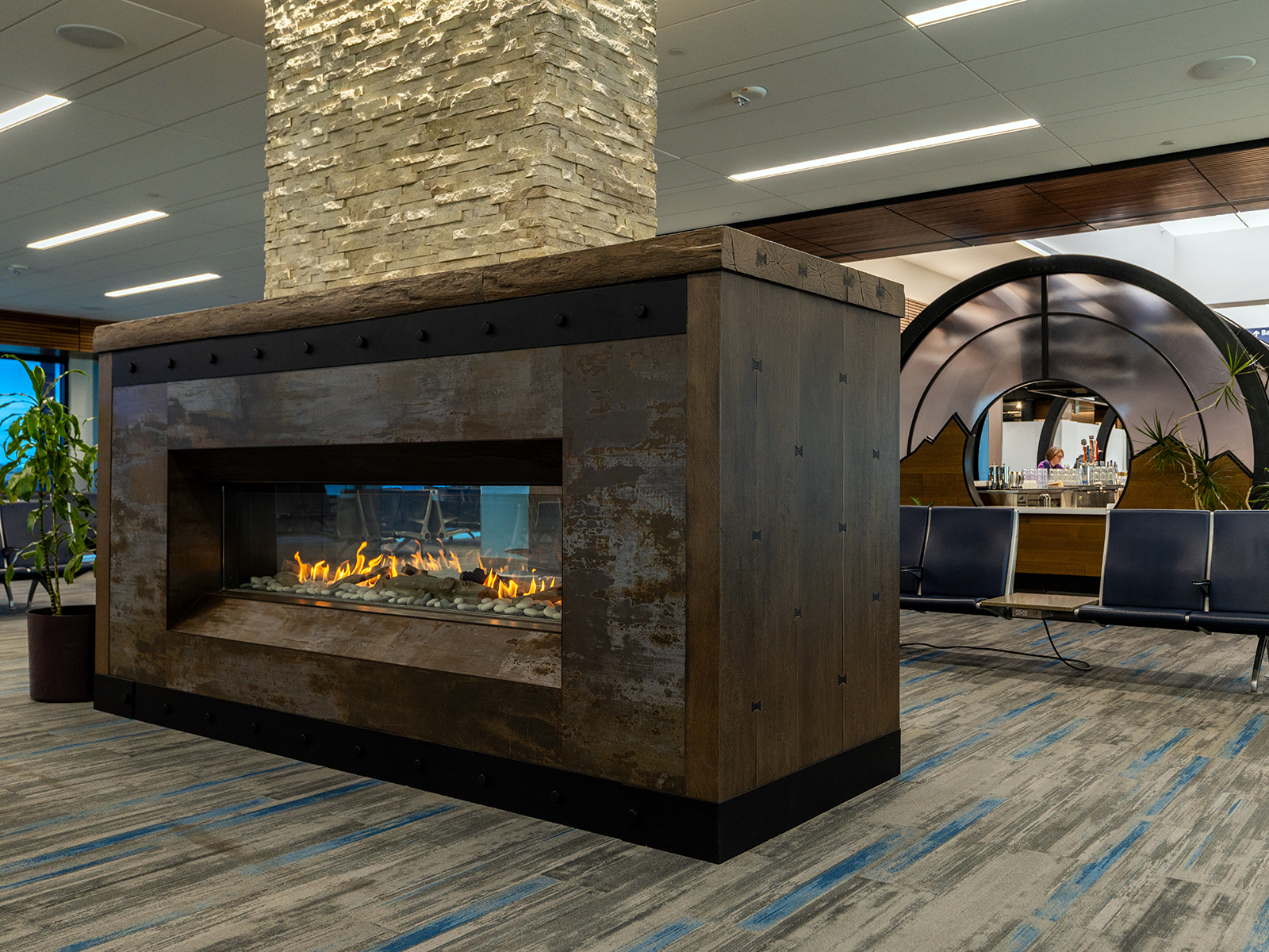 A fireplace and brewery inside the Colorado Springs Airport