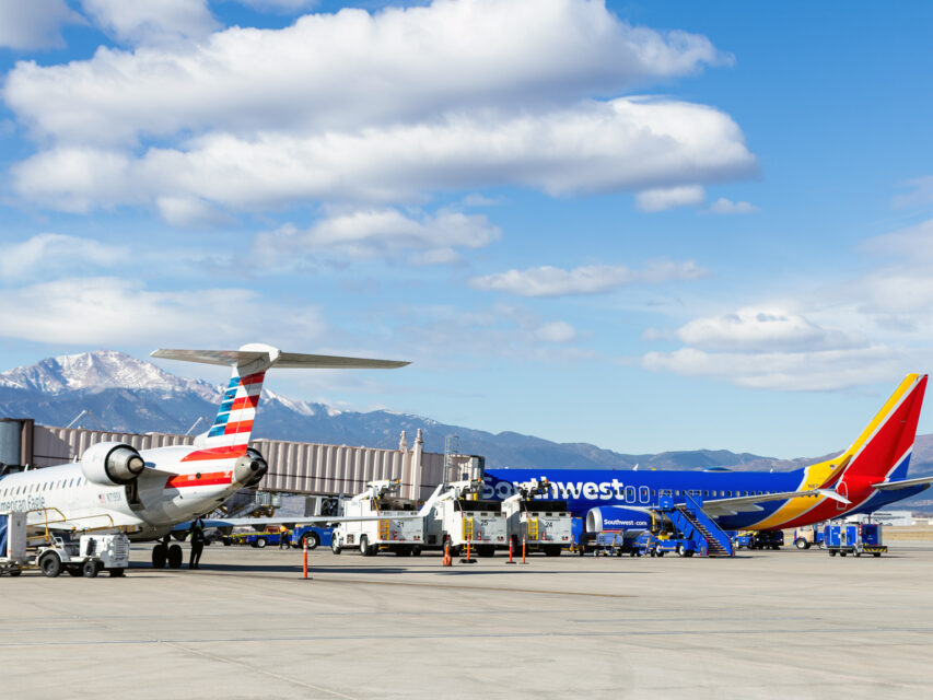 Two airplanes on the runway at Colorado Springs Airport