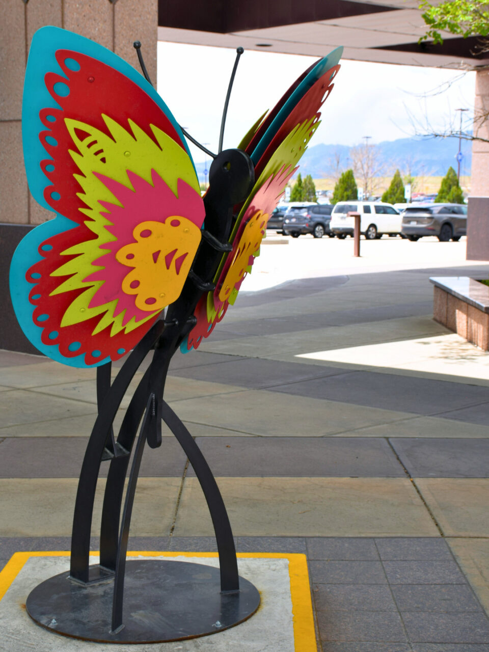 A colorful butterfly installation at Colorado Springs Airport