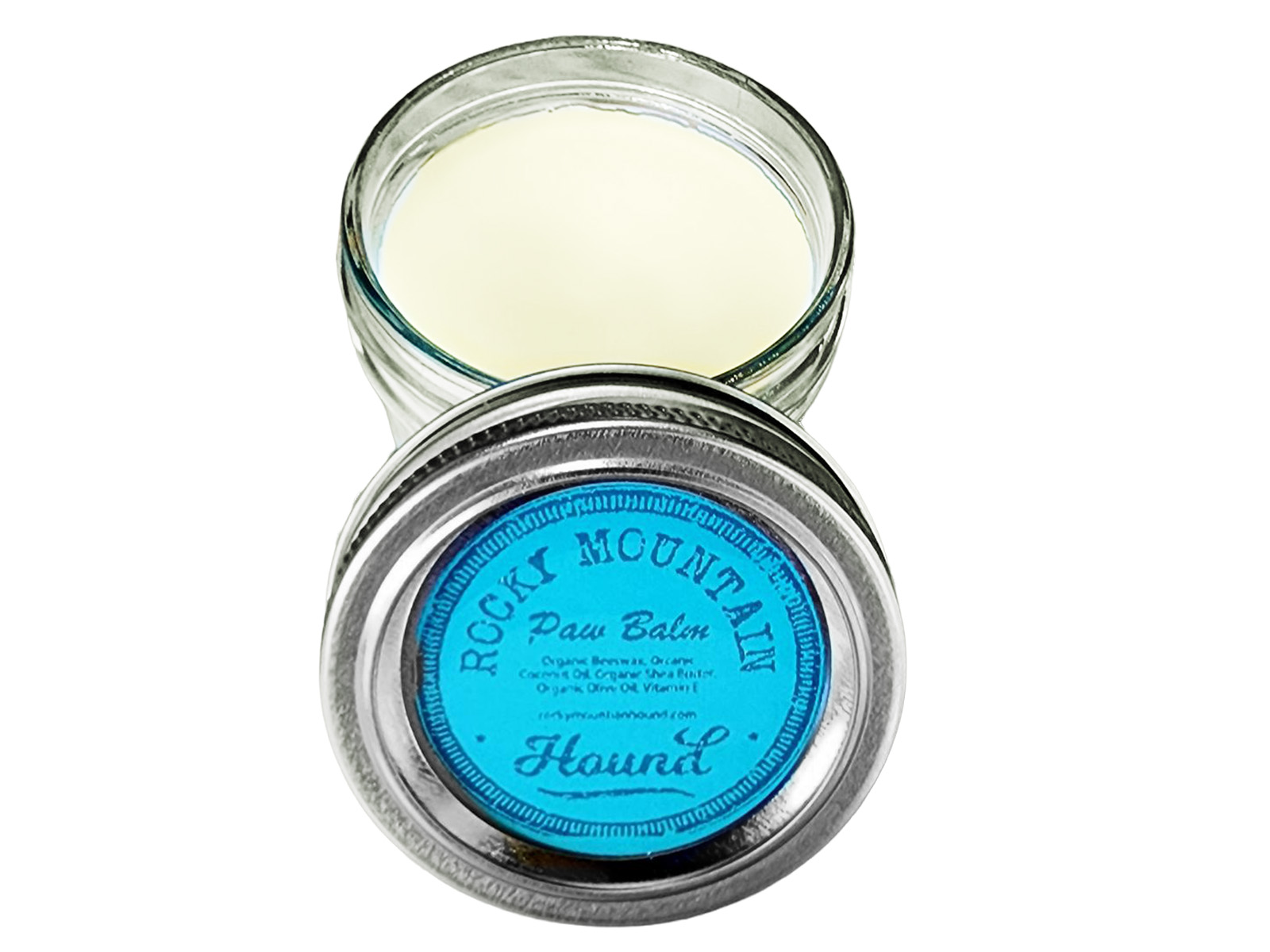 An open canister of Rocky Mountain Hound Paw Balm
