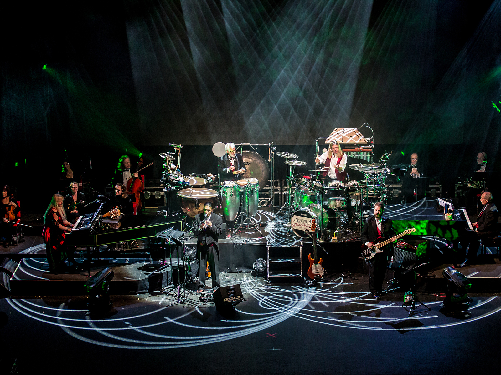 A bunch of musicians during a production of “Manheim Steamroller Christmas by Chip Davis”