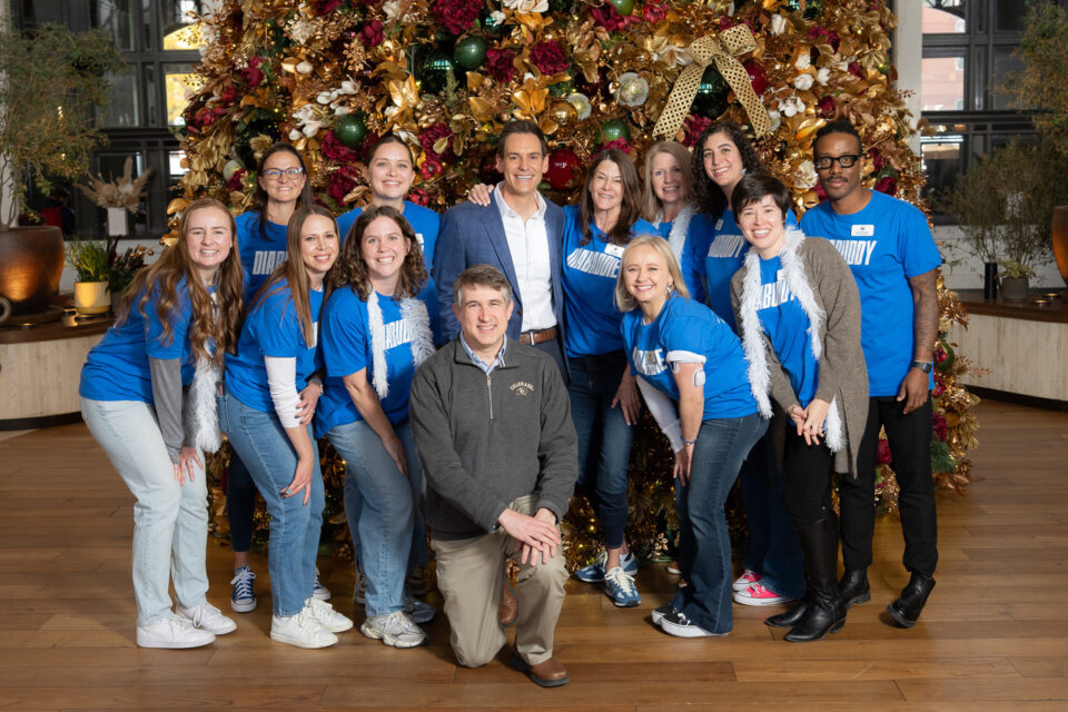 A group of people posed together.