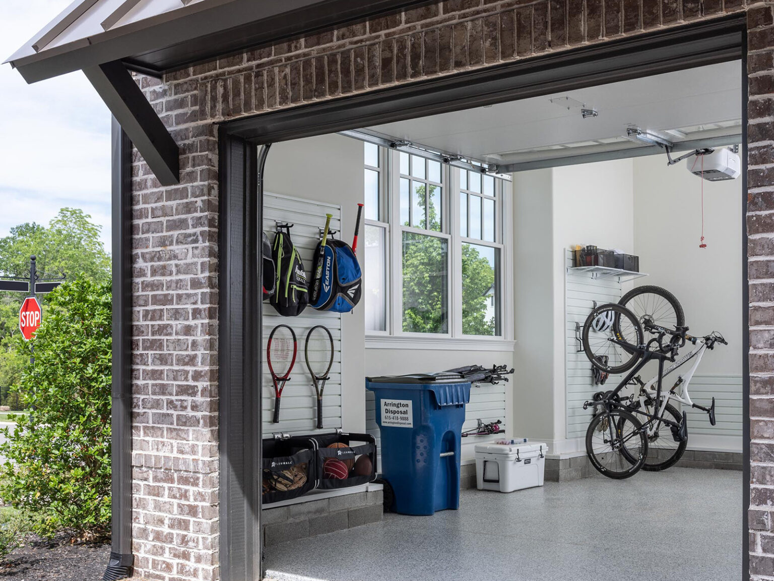 A garage with organized gear on the walls