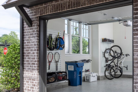 A garage with organized gear on the walls