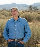 udall-mark_standing-outdoors